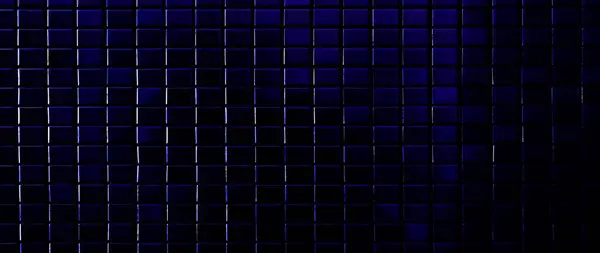 stock image Dark color Mosaic pattern of tiles, Wall is decorated with stained glass small plate, Beautiful mosaic wall luxurious or ceramic wall for luxurious pattern background.