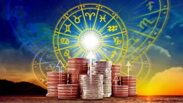 Burç işaretli yıldız falı ve astroloji, para, astroloji ve zenginlik kavramı gibi para sikkeleri, mali yıldız falı kavramı.