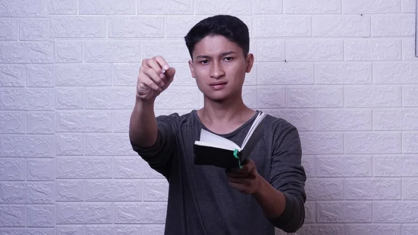 Asian Man Gray Shirt Holding Book Pen — Stock Photo, Image