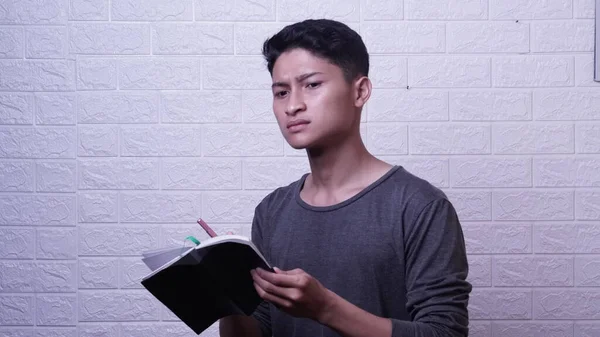 Asian Man Gray Shirt Holding Book Pen — Stock Photo, Image