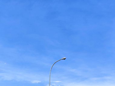 Street Lamp Against a Clear Blue Sky clipart