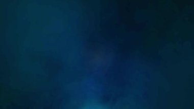 Bokeh ile soyut bir arkaplan. Yumuşak ışık odaklı noktalar.