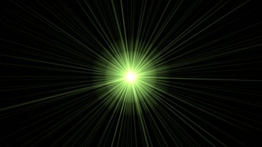 Yeşil uzayda parlayan ışınlar.