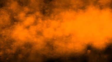 Siyah arka planda turuncu barut patlaması. Renkli bulut. Renkli toz patlar. Boya Holi.