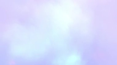 Yumuşak odaklı, bulanık bir video, daha koyu tonlarla harmanlanmış, öncelikli olarak turuncu ve kırmızı renklerin dinamik etkileşimini gösterir.