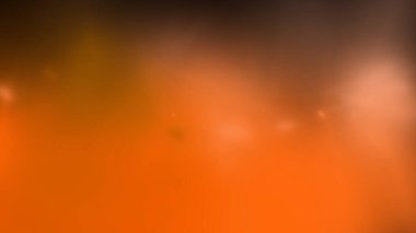 Bu resim yumuşak, bulanık turuncu bir arkaplan ve ince gölgeler içerir.