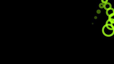 Girdap halinde, birbirine bağlı neon yeşil halkalar içeren dinamik ve soyut bir video.