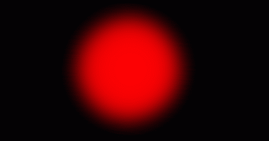 Bu resim, derin bir fırça arka planına karşı yumuşak, bulanık kenarlı canlı bir kırmızı oval şekle sahiptir.