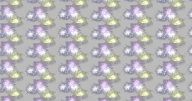 Bu pürüzsüz desen, yumuşak, pastel renkli lekelerin ve çiçeklerin tekrarlayan bir tasarımını içerir.