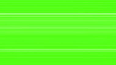 Beyaz ışık yeşillikler üzerinde enerjik bir şekilde dans eder.