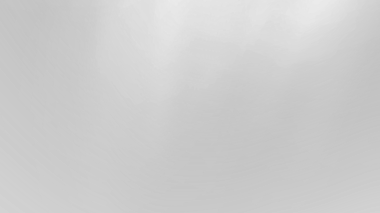 Yumuşak dokuları ve derinlik ve ruh halini çağrıştıran soyut gri tonlama gradyan arkaplan