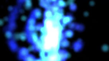 Dinamik mavi ışık parçacıkları içeren büyüleyici soyut video döngüsü büyüleyici ve ruhani bir parıltı yaratıyor. Projelerinize biraz sihir ve enerji katmak için mükemmel..