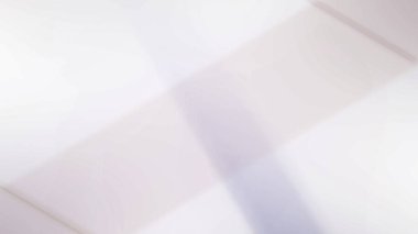 İnce geometrik şekiller ve nazik renk eğimleriyle soyut yumuşak ışık arkaplanı