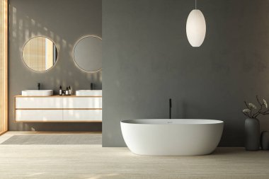 Çift lavabolu ve oval aynalı modern gri banyo, küvet, vazoda kuru bitkiler, granit zeminde halı. Otel stüdyosunda banyo aksesuarları ve pencere. 3B görüntüleme