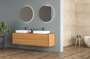 Modern banyo, mavi ve bej arka plan, parke döşeme, beyaz küvet, lavabo, bitki, yan görüş. Modern mobilyalı minimalist banyo. 3B görüntüleme