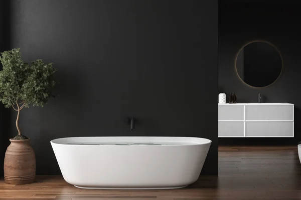 现代深色浴室 有灰色墙壁 软垫地板和舒适的水池 有黑色水龙头 挂在墙上的椭圆形镜子 3D渲染 — 图库照片
