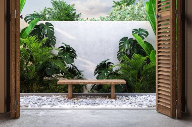 Arka bahçedeki çakıl taşları arasında rahat bir oturma alanı, duvarın arkasında saklı bitki ve ağaçlarla çevrili. Güneşli sahbah uzaya sıcak bir dokunuş katıyor. 3d Hazırlama