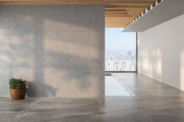 Beyaz duvarları ve beton döşemeleri olan, havuza bakan ve muhteşem deniz manzaralı bir tatil köşkünde ferah bir hava odası. Sıcak ve güneşli atmosfer mükemmel bir tatil titreşimi yaratıyor.