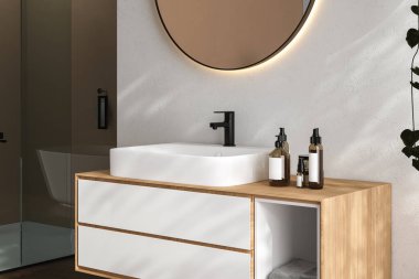 Lavabosu ahşap olan banyo. 