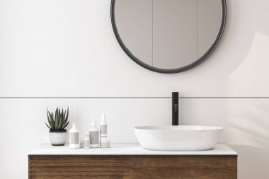 Lavaboyu kapat, oval ayna beyaz duvarda duruyor, minimalist banyoda siyah musluk olan ahşap dolap. Yan görüş. 3d oluşturma