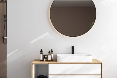 Lavaboyu kapat, oval ayna beyaz duvarda duruyor, minimalist banyoda siyah musluk olan beyaz dolap. Yan görüş. 3d oluşturma