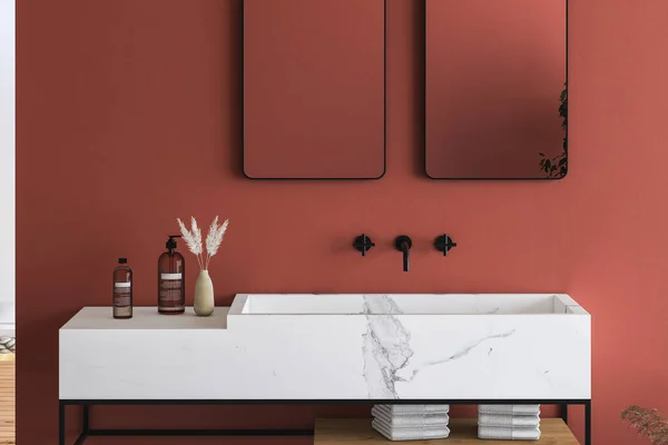 stock image red sink and white wall 