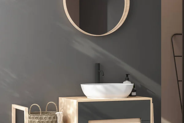 楕円形の鏡が暗い青色の壁にかかって白いシンクの近くに ミニマリストのバスルームで黒い蛇口と現代のキャビネット 3Dレンダリング — ストック写真