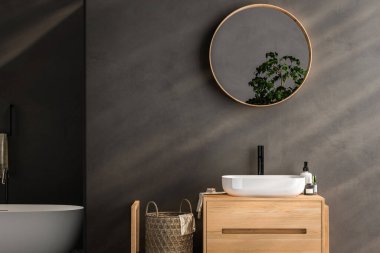 Boş alanı kapatıyoruz. Ahşap tezgahın üstünde lavabo var.,