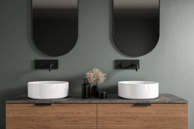 Chic bathroom setup with white double sink, soap dispensers, faucet, mirror, green wall background. Ideal for showcasing your products in a stylish and modern setting. Mock up. 3d rendering clipart