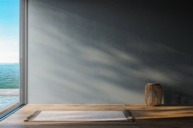 Mavi tonlu, duvar ve deniz manzaralı boş bir oturma odası.