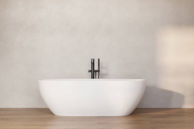 Küvetli, bej duvarlı, ahşap zeminli modern minimalist banyo..