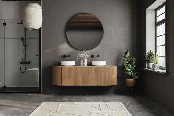 Modern banyo tasarımı, büyük bir ayna ve iki lavabo. Ayna ahşap bir dolap ve saksı bitkisiyle çevrili. Banyo modern ve şık bir tasarıma sahip.