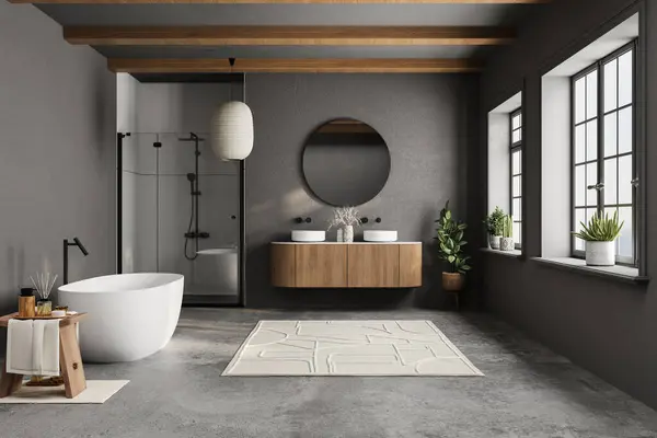 Büyük aynalı ve küvetli modern banyo. Banyo modern ve temiz görünüyor.