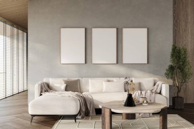 Bölgesel kanepesi olan rahat bir oturma odası, ahşap döşemeler ve dokulu bir duvarda boş tuval çerçeveler. Tarafsız tonlar ve doğal ışık. 3B Hazırlama