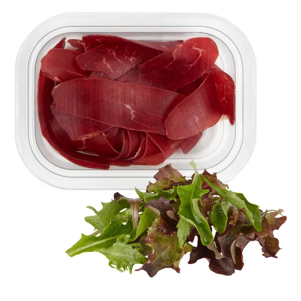 Smoked meat in a plastic box and fresh vegetables cut out isolated white background with clipping path