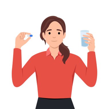 Bir bardak suyla ayakta duran mutlu genç kadın günlük vitamin dozunu alıyor. Mutlu kız ağrı kesici ya da antidepresan alır. İlaç ve uyuşturucu.