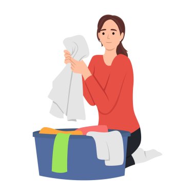 Çamaşır leğeninde kirli çamaşırları sıralayan ev işleri yapan genç bir kadın. Düz vektör çizimi beyaz arkaplanda izole edildi