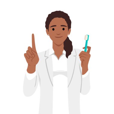 Elinde diş fırçası ve diş mankeni tutan genç bir dişçi. Düz vektör çizimi beyaz arkaplanda izole edildi