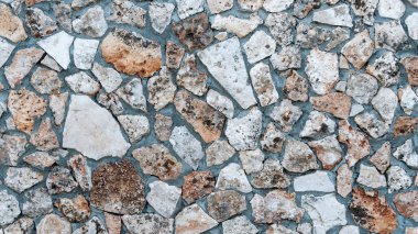 Eski gri tuğlalardan bir duvar manzarası