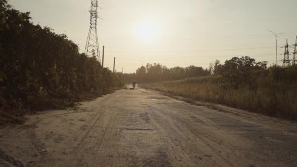 Stylish Man Riding Motorcycle Sunlight Road — Stock Video