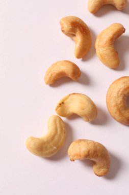dried cashew nuts on white background