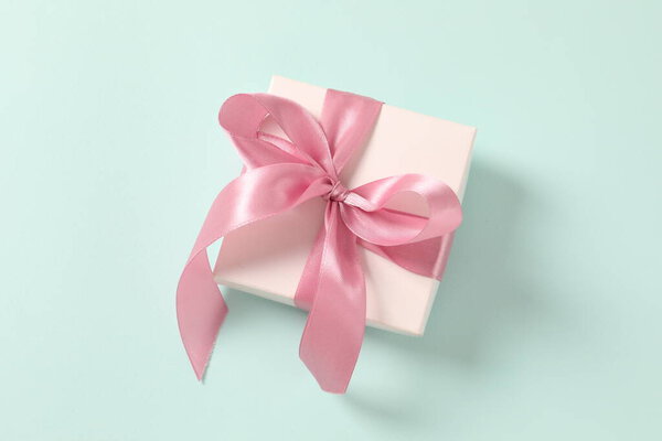 gift box on pink background. top view