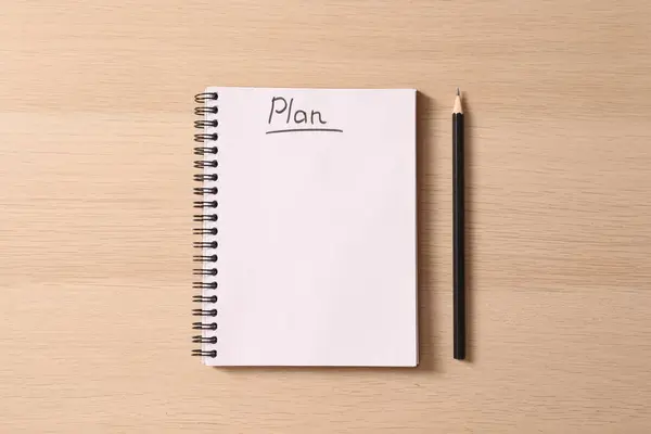Anteckningsbok Med Vit Penna Träbakgrund Koncept För Affärsplan Planering Planering — Stockfoto