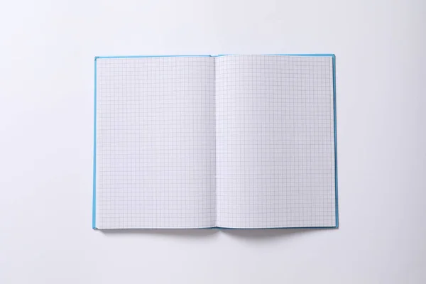 青い背景のノート — ストック写真