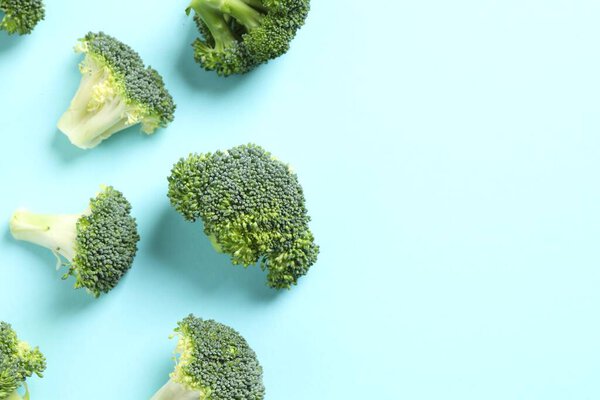 Fresh green broccoli on color background 