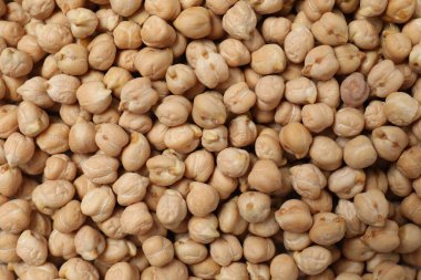 Çiğ nohut arka planı. Sağlıklı ve doğal vejetaryen yemekleri.