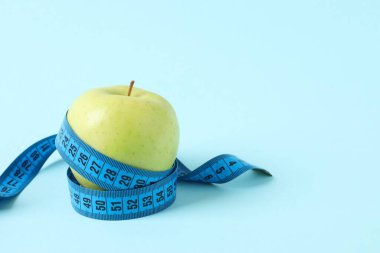 Diet and weight loss, healthy lifestyle, composition with measuring tape