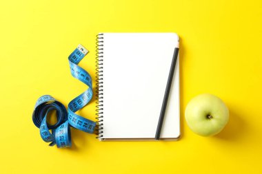 Diet and weight loss, healthy lifestyle, composition with measuring tape