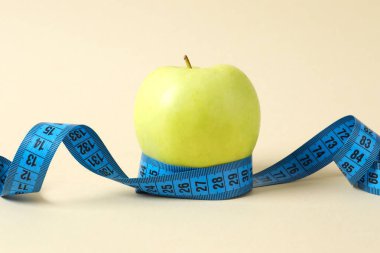 Diet and weight loss, healthy lifestyle, composition with measuring tape