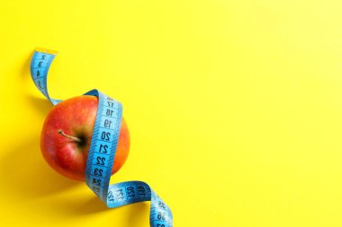 Diet and weight loss, healthy lifestyle, composition with measuring tape